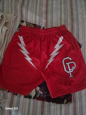 Men's Red Athletic Mesh Shorts with White Lightning Accent